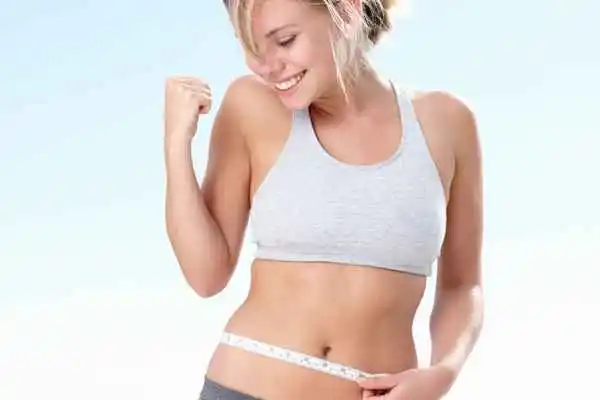 woman happy after fat reduction treatment Ross-on-Wye