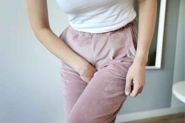 woman struggling with urine incontinence Ross-on-Wye
